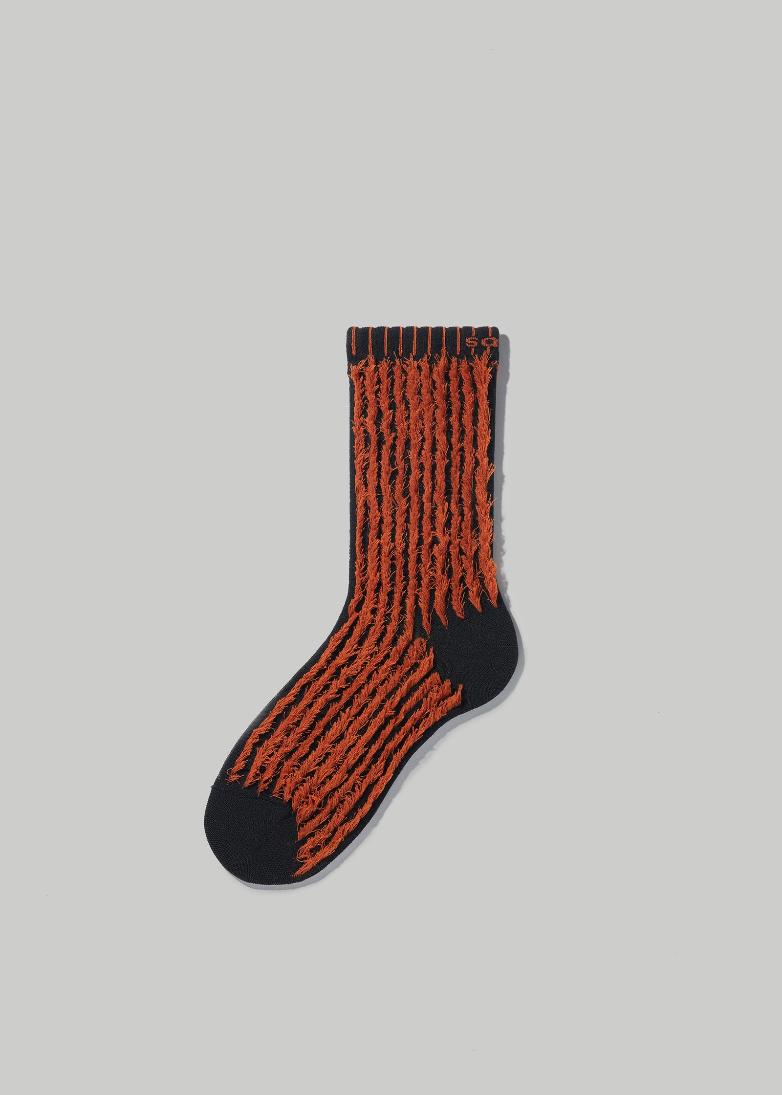 Fuzzy socks in Black and Rust